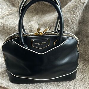 Marc Jacobs Black Satchel with Gold Hardware and Structured Design